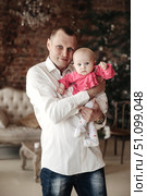 Daddy's Sweet Love a Cozy Moment Father Holding His Daughter Indoors. Стоковое фото, фотограф Aleksandr Golubev / Фотобанк Лори