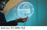 Interact with cutting-edge holographic displays showcasing future tech at the Innovation Expo. Стоковое AI-видео, аниматор Данила Большаков / Фотобанк Лори