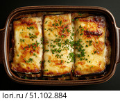 Moussaka with layers of eggplant, ground lamb, and bechamel sauce. Стоковое AI-изображение, AI-художник Татьяна  Бральнина / Фотобанк Лори