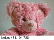 Pink fluffy teddy bear conveying comfort and warmth. Стоковое AI-изображение, AI-художник Иван Рябоконь / Фотобанк Лори