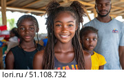 Three happy children and adult man in warm community setting, centered on bright-faced girl with beautiful smile and dreadlocks. Стоковое AI-изображение, AI-художник Данила Большаков / Фотобанк Лори