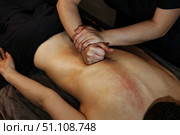 Therapeutic Back Work at a Spa to Alleviate Muscle Tension. Стоковое фото, фотограф Aleksandr Golubev / Фотобанк Лори