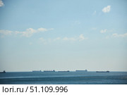 Merchant or industrial ships are in the roadstead. Waiting for unloading. Seascape. Стоковое фото, фотограф Наталия Кирсанова / Фотобанк Лори