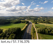 Highway a9 crossing Bavarian countryside near pegnitz, Germany, under cloudy sky. Стоковое фото, фотограф Данил Руденко / Фотобанк Лори