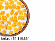 A bowl of golden cornflakes filled with milk is perfect for a quick and delicious breakfast. A cozy start to the day with a crunch and sweetness. Стоковое AI-изображение, AI-художник Светлана  Громак / Фотобанк Лори