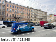 St. Petersburg, Russia - 06.10.2025: Blue car decorated with the colors and emblem of the Zenit football club on Nevsky Prospekt in St. Petersburg. Local sports pride and city life. Редакционное фото, фотограф Ирина Михайличенко / Фотобанк Лори
