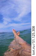 Relaxing Female Legs in Tropical Waves. Стоковое видео, видеограф Ольга Хорошунова / Фотобанк Лори