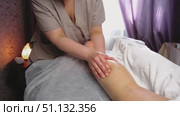 Natural medicine, reflexology, woman getting calf massage, depressing energy points, spa center. Стоковое видео, видеограф Владислав Тригуб / Фотобанк Лори