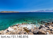 Agios Nikolaos coastline on a sunny day with clear sea and cliffs. (2019 год). Стоковое фото, фотограф Емельянов Евгений Викторович / Фотобанк Лори