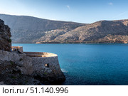 Spinalonga fortress on a clear sunny day. The ruins of leprosolium. (2019 год). Стоковое фото, фотограф Емельянов Евгений Викторович / Фотобанк Лори
