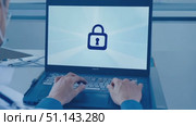 A health professional types securely on a laptop to protect patient information at a clinic. Стоковое AI-видео, аниматор Данила Большаков / Фотобанк Лори