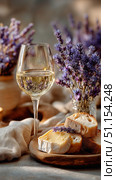 Delightful Wine and Cheese Pairing With Lavender Accents in a Cozy Setting. Стоковое AI-изображение, AI-художник Юлия Гапеенко / Фотобанк Лори