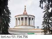 Moscow, Russia - March 24, 2023: Moscow VDNH. Architectural composition with bas-reliefs on one of the pavilions. Редакционное фото, фотограф Наталия Кирсанова / Фотобанк Лори