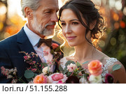 Happy elderly couple hugging each other on their wedding day, man and woman posing and looking at camera, sincerely repeating their vows. Стоковое AI-изображение, AI-художник Ирина Михайличенко / Фотобанк Лори