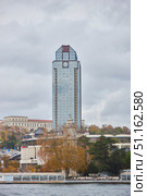 ISTANBUL, TURKEY - NOVEMBER 23, 2021: Suvar Plaza office building on the shore of the Bosphorus Strait. Редакционное фото, фотограф Наталия Кирсанова / Фотобанк Лори