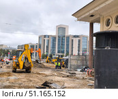 Работы по благоустройству  в центре Москвы.  Чистые пруды и офис Газпрома. Редакционное фото, фотограф Мария Сергеева / Фотобанк Лори