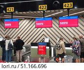 Регистрация на бизнес-класс авиакомпаний Аэрофлот и Россия в аэропорту Шереметьево. Редакционное фото, фотограф Мария Сергеева / Фотобанк Лори
