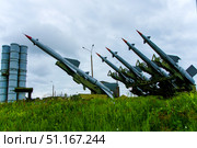 A row of anti-aircraft missiles stands on a grassy field. Belarus. Minsk. 10.08.25. Редакционное фото, фотограф Ярославский Максим / Фотобанк Лори