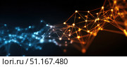Dynamic plexus network featuring interconnected orange and blue particles glowing against dark backdrop, representing technological communication and scientific innovation. Стоковое AI-изображение, AI-художник Юрий Поздников / Фотобанк Лори