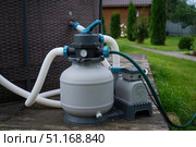 System pump of filtering, ozonation equipment for maintaining clean an outdoor swimming pool filtration system. Стоковое фото, фотограф Ирина Старикова / Фотобанк Лори