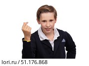 Portrait of a cheerful boy, he snaps his finger on a white background in close-up. Стоковое фото, фотограф Лазаренко Светлана / Фотобанк Лори