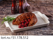 Baked pork sirloin with cornus. Стоковое фото, фотограф Андрей Старостин / Фотобанк Лори