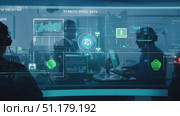 A cybersecurity team collaborates in a high-tech setting, focused on data analysis and strategy discussions in the late afternoon. Стоковое AI-видео, аниматор Данила Большаков / Фотобанк Лори