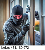 Masked Burglar Attempting To Break Into A House Through A Window. Generative AI. Стоковое AI-изображение, AI-художник Roman Zavorotny / Фотобанк Лори