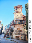 Tbilisi, Georgia - 04 January, 2023: Old City center. The famous puppet theater of Rezo Gabriadze. Редакционное фото, фотограф Наталия Кирсанова / Фотобанк Лори