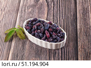 Sweet juicy ripe honeysuckle berries. Стоковое фото, фотограф Андрей Старостин / Фотобанк Лори