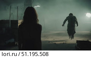 A figure looms in the shadowy depths of an abandoned warehouse, creating an unsettling atmosphere of suspense and dread as someone stands in the foreground. Стоковое AI-видео, аниматор Данила Большаков / Фотобанк Лори