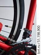 Details of a sports bike in close-up. A road bike for cycling or triathlon. Стоковое фото, фотограф Наталия Кирсанова / Фотобанк Лори