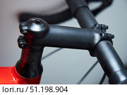 Details of a sports bike in close-up. A road bike for cycling or triathlon. Стоковое фото, фотограф Наталия Кирсанова / Фотобанк Лори
