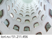 Architectural background, spiral staircase with windows opening into a skylight under the dome. Стоковое фото, фотограф Евгений Харитонов / Фотобанк Лори