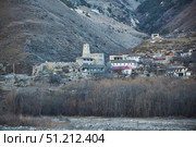 Mizur, Russia. - January 06, 2024: A village in North Ossetia on the way to the Tsey ski resort. Редакционное фото, фотограф Наталия Кирсанова / Фотобанк Лори