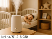 A Tranquil Scene of a Humidifier Providing Relief to a Sleeping Child in a Peaceful Bedroom Environment with Soft Natural Lighting. Стоковое AI-изображение, AI-художник Башкирова Анна / Фотобанк Лори