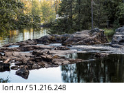 Akhinkoski Waterfalls or Ruskeala Waterfalls on the Tohmajoki River. Russia, Republic of Karelia. Стоковое фото, фотограф Photojuli / Фотобанк Лори