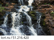 Yukankoski Waterfall (White Bridges) in the Republic of Karelia on a summer evening, Russia. Стоковое фото, фотограф Photojuli / Фотобанк Лори