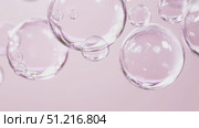Soap bubbles floating on soft gradient background. Стоковое AI-видео, аниматор Анастасия Золотницкая / Фотобанк Лори