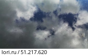 Rain and sky with clouds reflection in water. Стоковое видео, видеограф Михаил Коханчиков / Фотобанк Лори