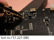 The SMD component tester. Investigation of the parameters of the SMD components using a tester probe. Стоковое фото, фотограф Valeriy Lushchikov / Фотобанк Лори