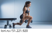 Female athlete performing bulgarian split squat with dumbbells, demonstrating strength training technique in well lit fitness environment. Стоковое AI-видео, аниматор Юрий Поздников / Фотобанк Лори