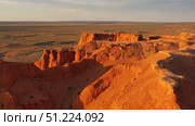 Bayanzag flaming cliffs at sunset in Mongolia. Стоковое фото, фотограф Михаил Коханчиков / Фотобанк Лори