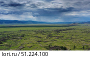Steppe and mountains with rain landscape. Стоковое фото, фотограф Михаил Коханчиков / Фотобанк Лори