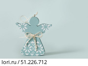 Handmade Wooden Angel Ornament with Bow Design. Стоковое фото, фотограф Светлана Лажко / Фотобанк Лори