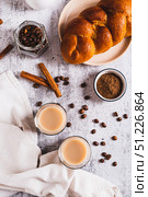Yemeni coffee with spices and cream in glasses and crispy bread top and vertical view. Стоковое фото, фотограф Елена Руй / Фотобанк Лори