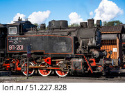 An old Soviet steam locomotive of the L series. The Ruskeala Express retro train is at the Sortavala station. Russia, Republic of Karelia, Sortavala, August 12, 2025. Редакционное фото, фотограф Photojuli / Фотобанк Лори