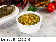 Souce gherkin relish with marinated cucumbers. Стоковое фото, фотограф Андрей Старостин / Фотобанк Лори