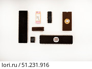 Several different chips on a white background. Old electronic chips. Стоковое фото, фотограф Valeriy Lushchikov / Фотобанк Лори