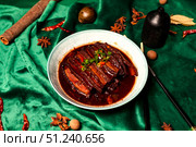 Dongpo Pork Belly Simmering in Sauce Awaits Diners at a Chinese Restaurant. Стоковое фото, фотограф Aleksandr Golubev / Фотобанк Лори